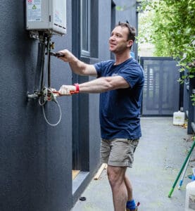 Professional Watsonia plumber showcasing an instant hot water system installation in a Watsonia residence