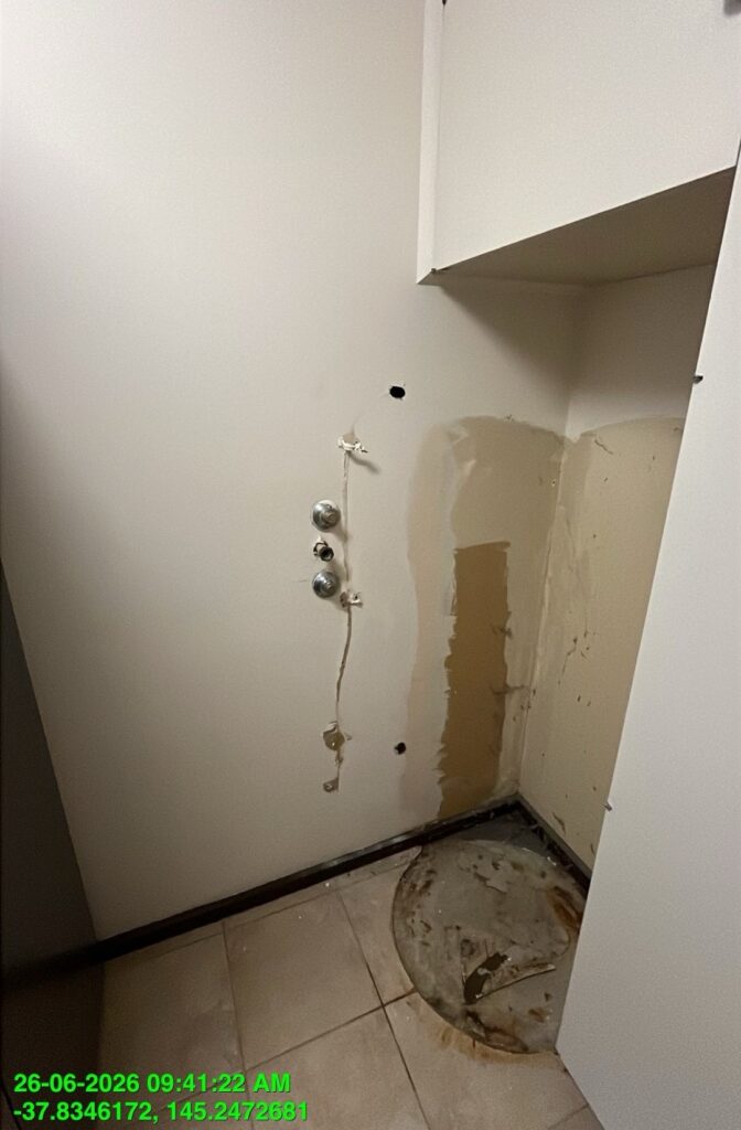 Disconnected Rheem electric hot water unit during installation in Ringwood